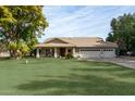 Single story home with three car garage and spacious yard at 6841 N 183Rd Ave, Waddell, AZ 85355