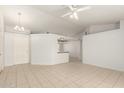 Bright living room with tile flooring and high ceilings at 7915 W Wethersfield Rd, Peoria, AZ 85381