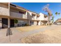 View of multiple tan townhomes, showing building exterior at 944 S Valencia -- # 3, Mesa, AZ 85202