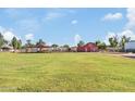 View of agricultural outbuildings on a large property at 9449 S 156Th Pl, Gilbert, AZ 85234