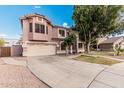 Two-story house with a large driveway at 1503 N Quail Ln, Gilbert, AZ 85233