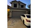 Two-story house with attached garage and driveway at 19814 N 49Th Dr, Glendale, AZ 85308