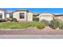 House exterior showcasing manicured lawn and driveway at 2142 W Enfield Way, Chandler, AZ 85286