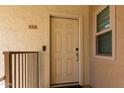 Condo building entryway with door and security features at 2146 W Isabella Ave # 252, Mesa, AZ 85202