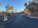 Gated entrance to the community with parking lot visible at 2625 E Indian School Rd # 226, Phoenix, AZ 85016