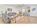 Bright living room features hardwood floors and modern decor at 463 W Pinnacle Ridge Dr, San Tan Valley, AZ 85140