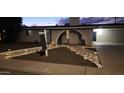 Single story home with landscaped walkway at dusk at 466 E 10Th Pl, Mesa, AZ 85203