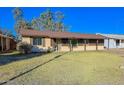 Ranch-style home with a well-maintained lawn and driveway at 6016 N 36Th Dr, Phoenix, AZ 85019