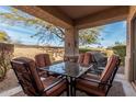 Relaxing patio with seating area and a grill at 846 N Pueblo Dr # 104, Casa Grande, AZ 85122