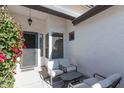 Front patio with seating area and bougainvillea at 862 E Gemini Pl, Chandler, AZ 85249