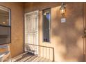 Condo entry with security door and window at 8787 E Mountain View Rd # 2101, Scottsdale, AZ 85258