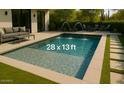 Inviting 28 x 13 ft pool featuring deck jets, in-pool lounge, and adjacent patio with ample seating at 9439 E Palm Tree Dr, Scottsdale, AZ 85255