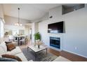 Living room features a fireplace and dining area at 170 E Guadalupe Rd # 174, Gilbert, AZ 85234