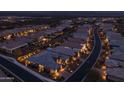 Night view of upscale community with beautifully lit homes at 17904 E Veit Springs Dr, Rio Verde, AZ 85263