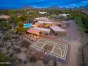 Stunning property featuring a large pool and private basketball court at 23414 N 84Th Pl, Scottsdale, AZ 85255