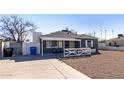 Charming bungalow with front porch and gravel driveway at 2605 W Montebello Ave, Phoenix, AZ 85017