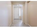 Bright entryway with tiled floor and white door at 2702 E Saddlebrook Rd, Gilbert, AZ 85298