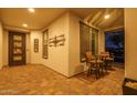 Welcoming entryway with tiled flooring and wrought iron front door at 28226 N Crook Ct, Rio Verde, AZ 85263