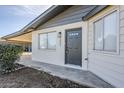 Dark gray front door and freshly painted exterior at 3021 W Ocotillo Rd, Phoenix, AZ 85017