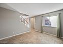 Living room with tile floors and neutral wall colors at 3511 E Baseline Rd # 1147, Phoenix, AZ 85042