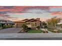 Stunning curb appeal featuring a beautifully landscaped yard and inviting entryway at 3560 E Ironside Ln, Gilbert, AZ 85298