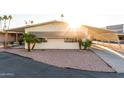 Side view of a single-story manufactured home with a covered carport at 401 N 68Th Ave # 247, Phoenix, AZ 85043