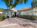 Front view of house showing landscaping, walkway, and entryway at 4142 E Sahuaro Dr, Phoenix, AZ 85028