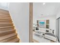 View of living room from upstairs, featuring a white couch at 4220 N 32Nd St # 32, Phoenix, AZ 85018