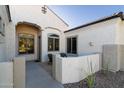 Front entry with seating area and side yard view at 4332 S Primrose Dr, Gold Canyon, AZ 85118