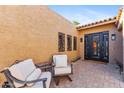 Inviting entryway with comfortable seating and modern wall art at 4450 E Camelback Rd # 4, Phoenix, AZ 85018