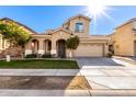 Two-story house with attached garage and landscaped front yard at 5331 E Holmes Ave, Mesa, AZ 85206