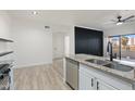 Open concept kitchen featuring granite countertops and modern cabinetry at 5345 E Van Buren St # 226, Phoenix, AZ 85008