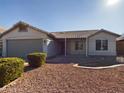 Front view of the house, showcasing its curb appeal at 8623 W Athens St, Peoria, AZ 85382