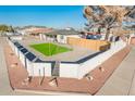 Home with a fenced yard and artificial turf at 10902 W Flanagan St, Avondale, AZ 85323