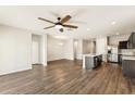 Modern kitchen with stainless steel appliances and an island at 11225 E Marigold Ln, Florence, AZ 85132