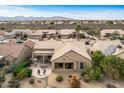 Home's backyard and patio with a view of the surrounding neighborhood at 18137 N Estrella Vista Dr, Surprise, AZ 85374