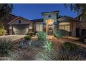 Attractive single-story home with landscaped front yard and two-car garage at 23219 N 41St St, Phoenix, AZ 85050