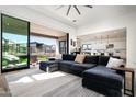 Open living space with sliding doors leading to backyard at 23766 N 123Rd Way, Scottsdale, AZ 85255