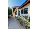 House exterior showcasing walkway and landscaping at 2615 W Hearn Rd, Phoenix, AZ 85023