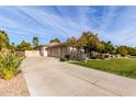 Attached garage with long driveway at 3326 E Ivyglen Cir, Mesa, AZ 85213