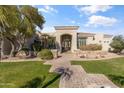 Stunning curb appeal with a brick walkway and lush landscaping at 4330 E Gemini Pl, Chandler, AZ 85249