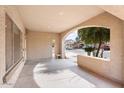 Covered front porch with view of the neighborhood at 45354 W Horse Mesa Rd, Maricopa, AZ 85139