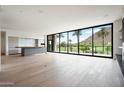 Bright, open living space with floor-to-ceiling windows showcasing beautiful golf course views at 4575 N Phoenician Blvd # 2, Scottsdale, AZ 85251
