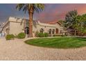 Single story home with circular driveway and lush landscaping at 4920 E Beryl Ave, Paradise Valley, AZ 85253