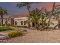 Beautiful desert landscaping surrounds this single story home at 4920 E Beryl Ave, Paradise Valley, AZ 85253