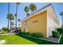 Building exterior with mid-century modern architecture and landscaping at 6805 E 2Nd St # 17, Scottsdale, AZ 85251