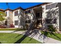 Condo building exterior with stairs and landscaping at 9990 N Scottsdale Rd # 2048, Paradise Valley, AZ 85253