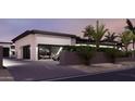 Spacious garage boasts modern design, with the capacity to park multiple cars at 11612 N 86Th St, Scottsdale, AZ 85260