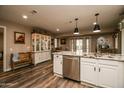 Kitchen features granite countertops and stainless steel dishwasher at 17826 N Buntline Dr, Sun City West, AZ 85375