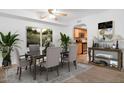 Charming dining area includes a dining table with seating for six and a ceiling fan at 3825 E Camelback Rd # 239, Phoenix, AZ 85018